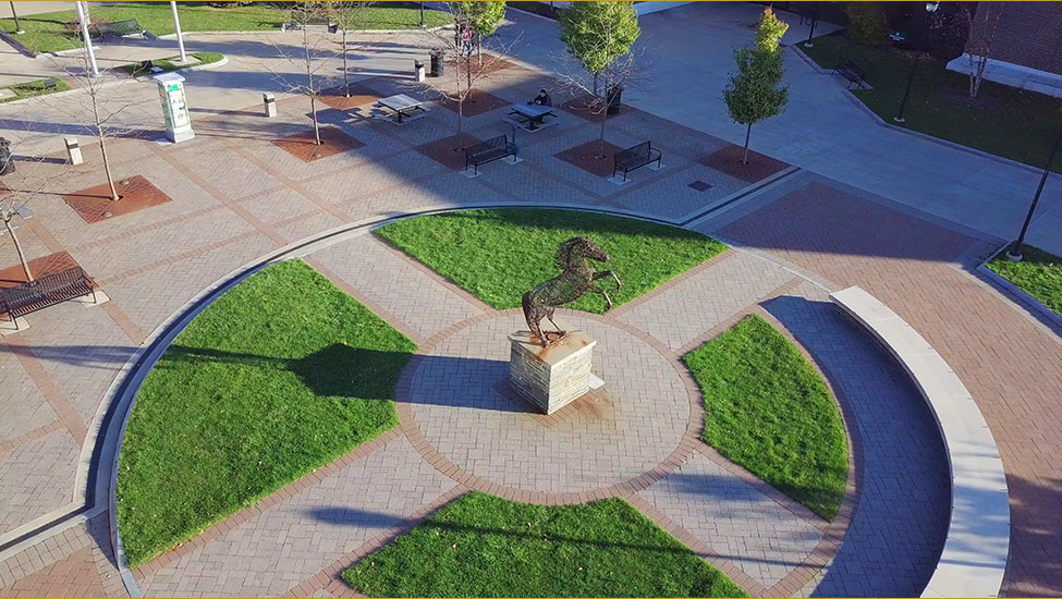 aerial shot of the admin quad, featuring the mustang statue