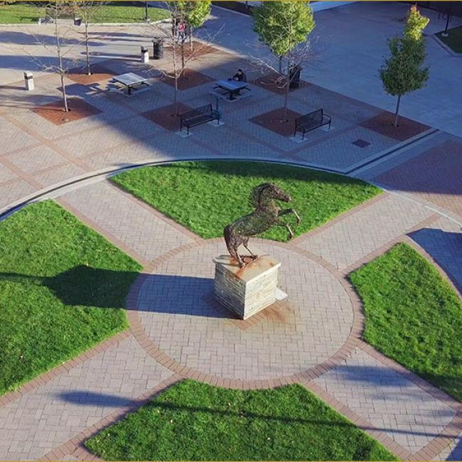 aerial shot of the admin quad, featuring the mustang statue