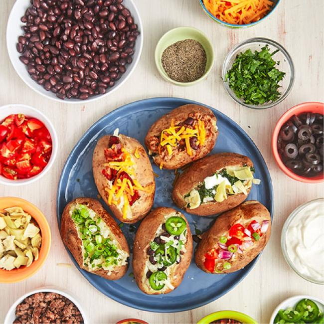 Baked Potatoes and assorted toppings