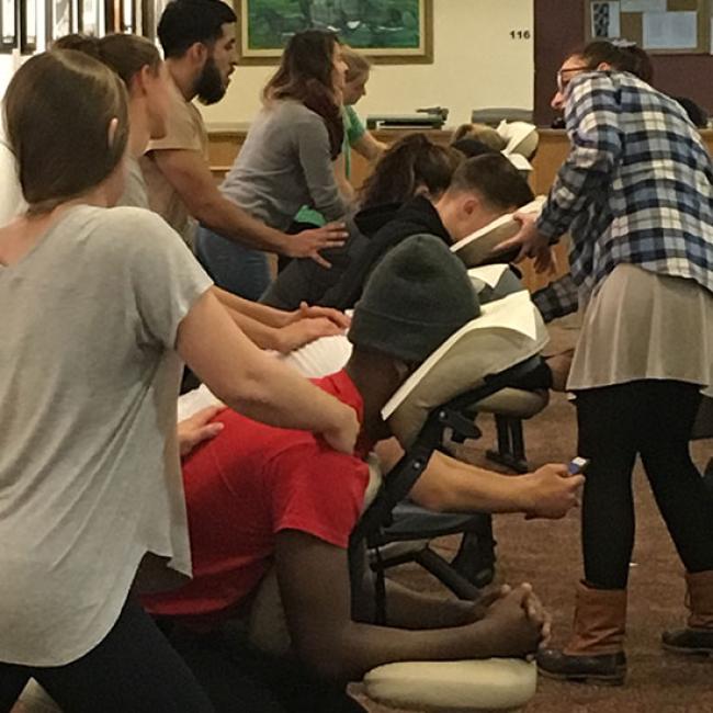 massage therapy students deliver free chair massages