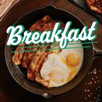 cast iron skillet with eggs and bacon cooking